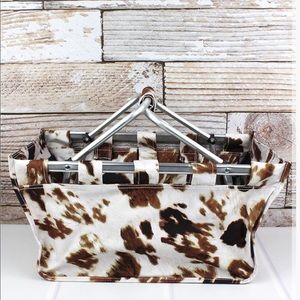 Collapsible cow print basket